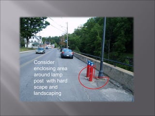 Consider enclosing area around lamp post  with hard scape and landscaping 