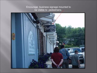 Encourage  business signage mounted to be visible to  pedestrians.  