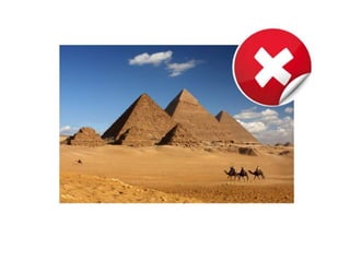 Photo of the pyramids with a cross on the corner
 