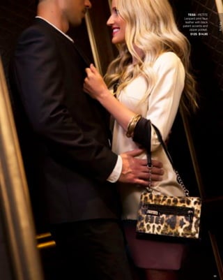 TESS - PETITE
 Leopard print faux
  leather with black




                            PETITE
patent accents and
     zipper pocket.
      5125 $14.95




                       60
 