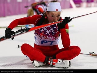 Selina Gasparin of Switzerland kisses her ski after taking silver in the women's 15km individual cross-country skiing even...
