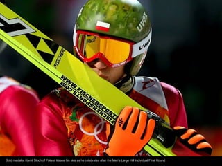 Gold medalist Kamil Stoch of Poland kisses his skis as he celebrates after the Men's Large Hill Individual Final Round

 