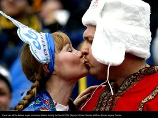 Fans kiss at the ladies' super combined slalom during the Sochi 2014 Olympic Winter Games at Rosa Khutor Alpine Center.

 