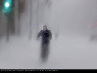 A man rides his bike up Beacon Street during a blizzard in Boston, January 27, 2015. Reuters/Dominick Reuter
 