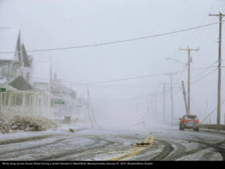 Wires hang across Ocean Street during a winter blizzard in Marshfield, Massachusetts January 27, 2015. Reuters/Brian Snyder
 