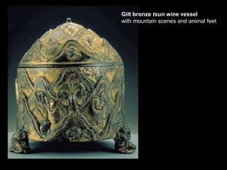 Gilt bronze tsun wine vessel
with mountain scenes and animal feet
 