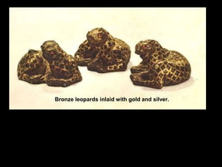 Bronze leopards inlaid with gold and silver.
 