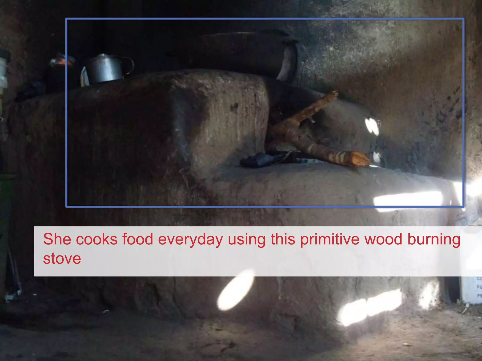 2She cooks food everyday using this primitive wood burning stove