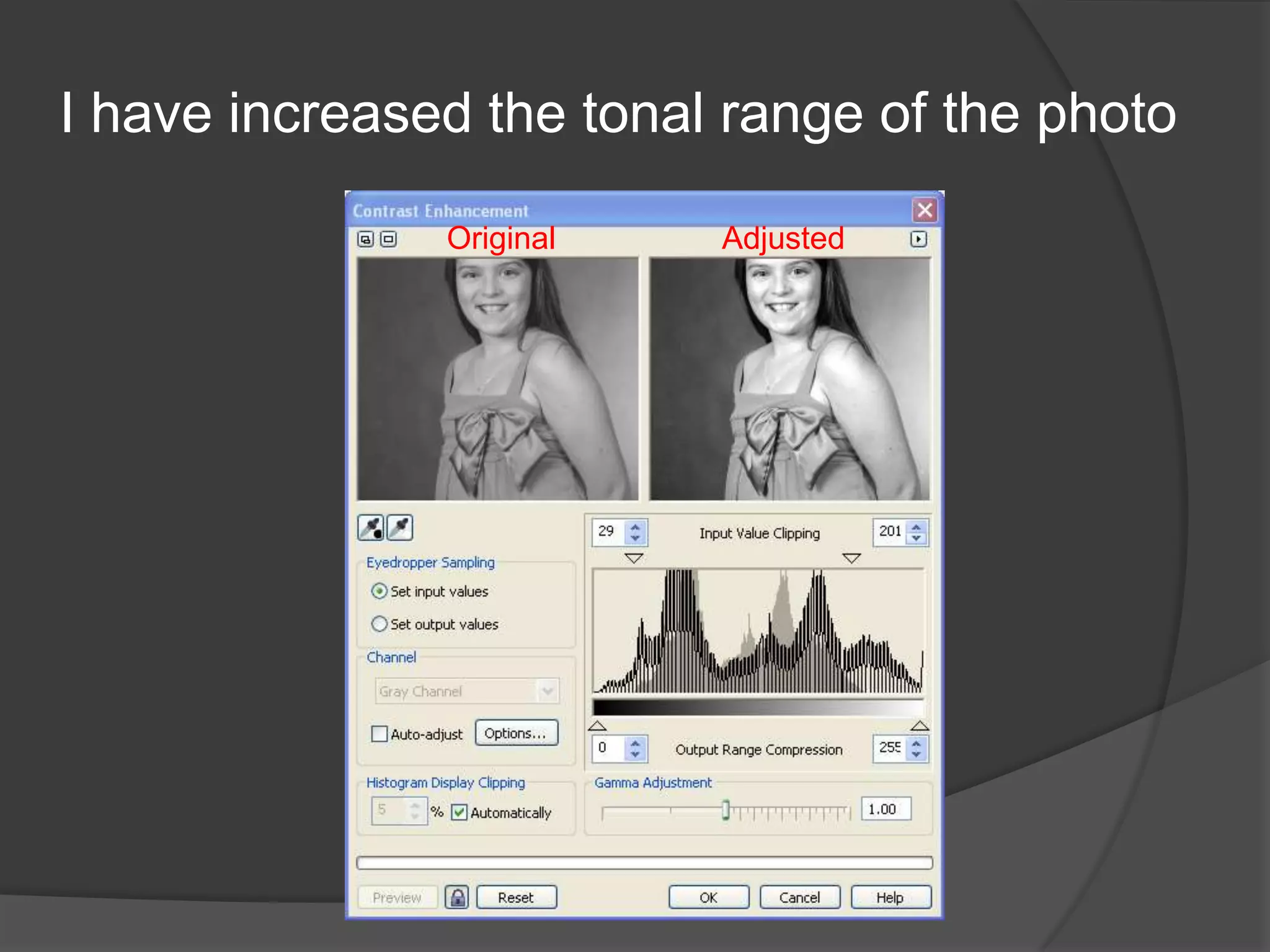 I have increased the tonal range of the photo

               Original   Adjusted
 