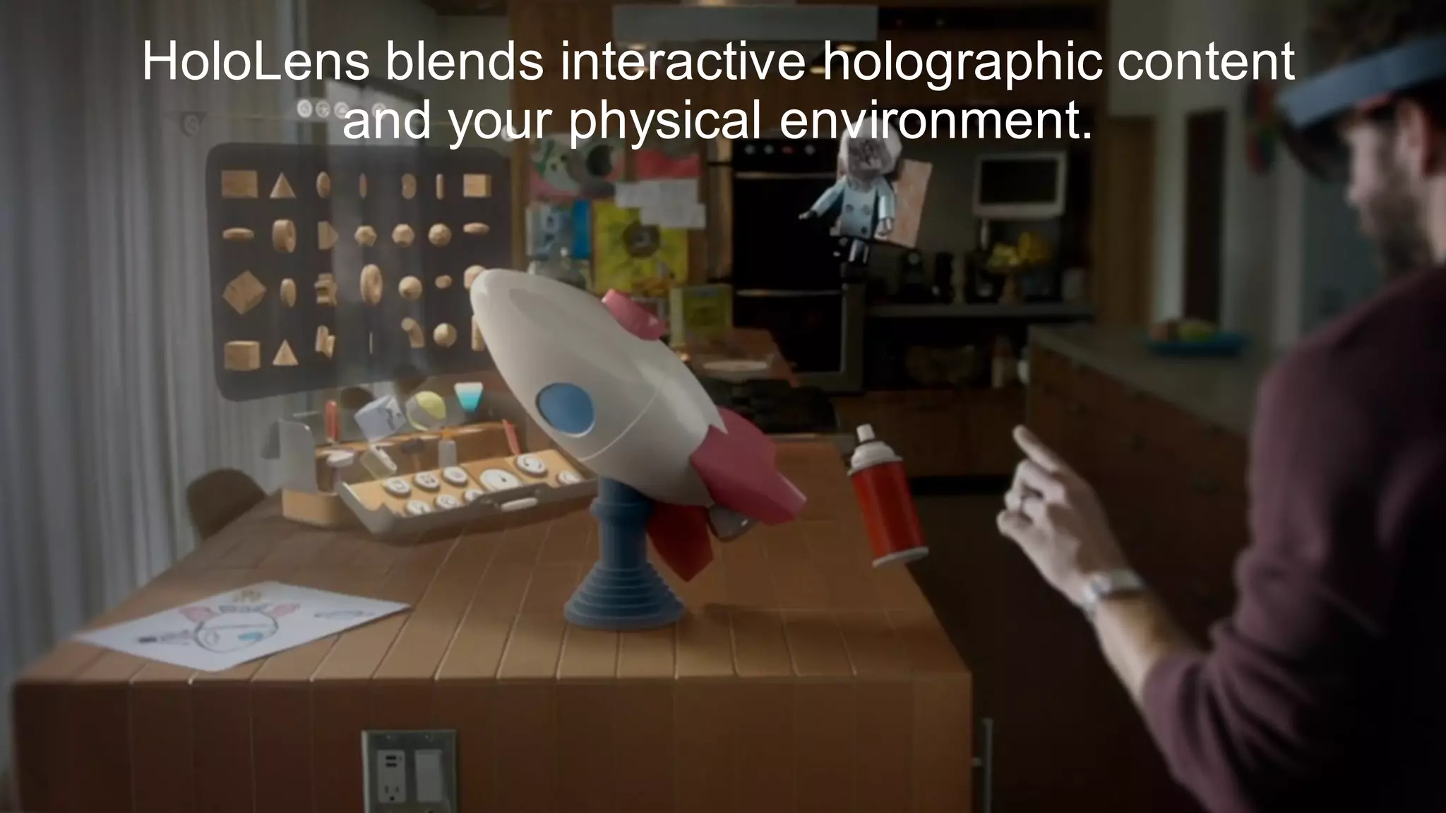 HoloLens blends interactive holographic content
and your physical environment.
 