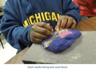 Noah needle felting with wool fleece
 