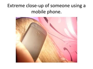 Extreme close-up of someone using a
           mobile phone.
 