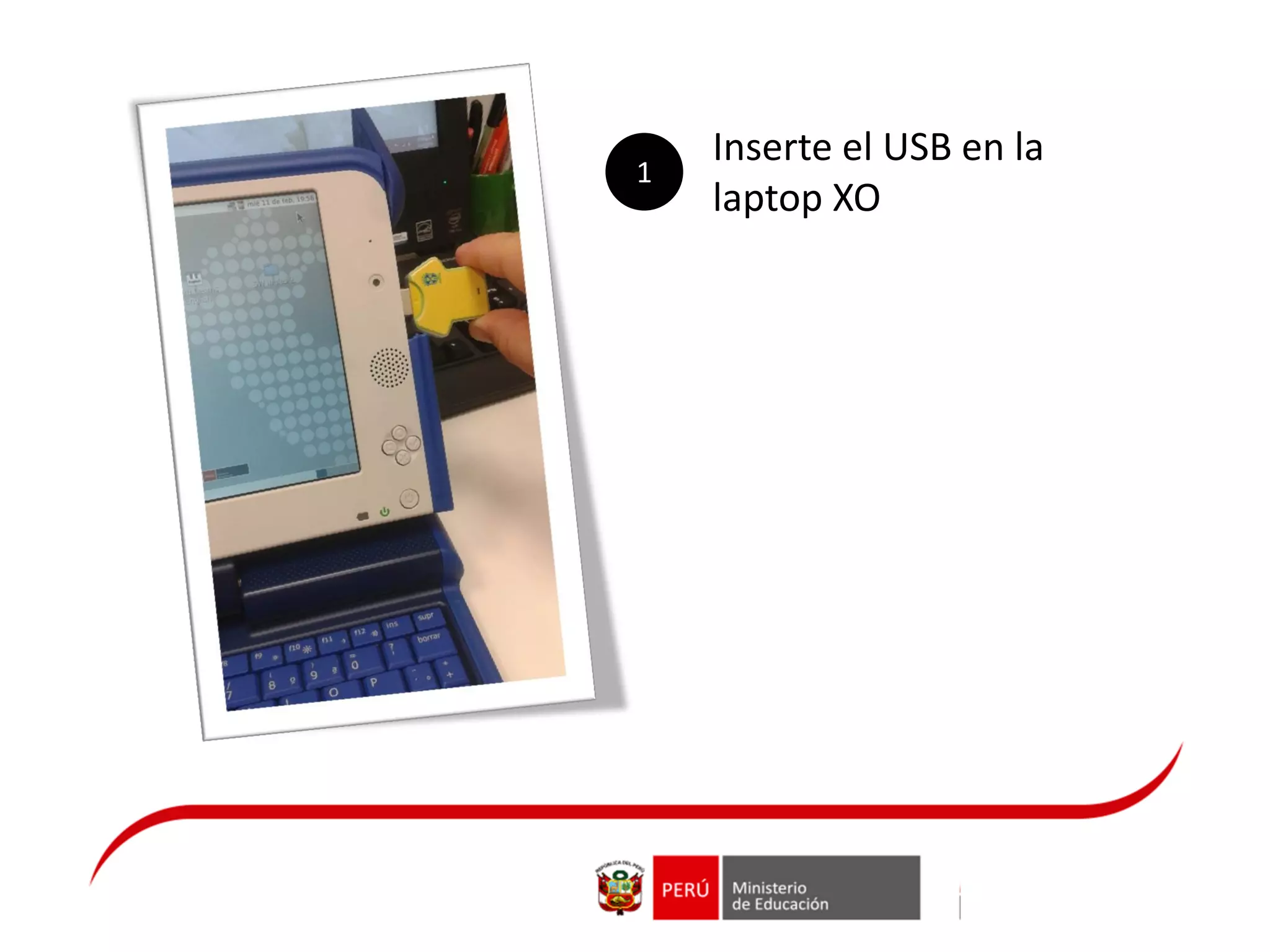 Inserte el USB en la
laptop XO
1
 