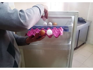 arranging / putting eggs into the fridge