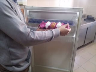 arranging / putting eggs into the fridge