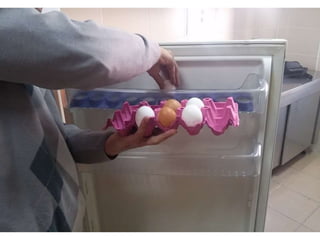 arranging / putting eggs into the fridge