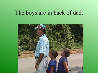 The boys are in back of dad.