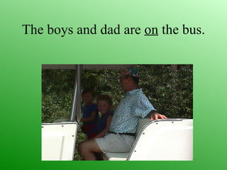 The boys and dad are on the bus.