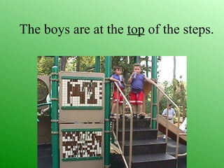 The boys are at the top of the steps.
