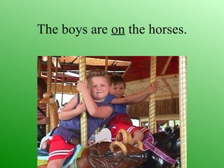The boys are on the horses.